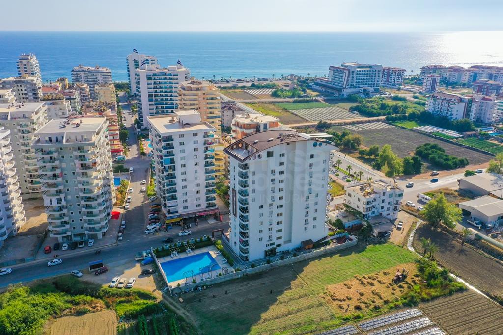 Furnished 1+1 apartment in Mahmutlar with a sea view id 3558