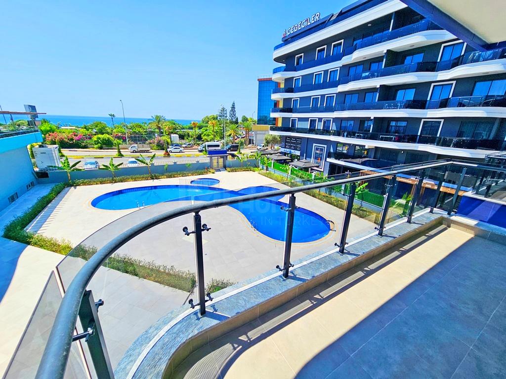 Furnished 1+1 apartment with a sea view in Kargicak id 4701
