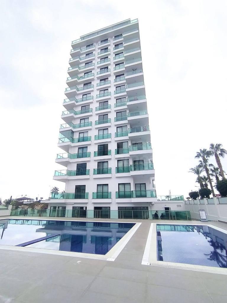 </noscript>SUNSET AQUA Furnished 2+1 apartment in front of the sea in Mahmutlar id 6553